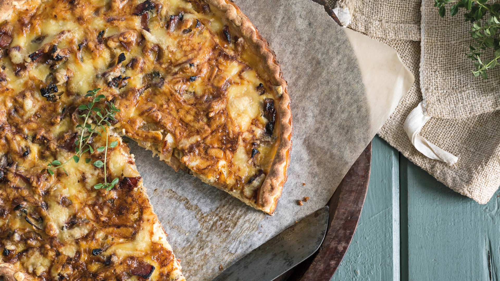 Our gluten free French onion tart recipe is filled with caramelised onions and gruyere cheese