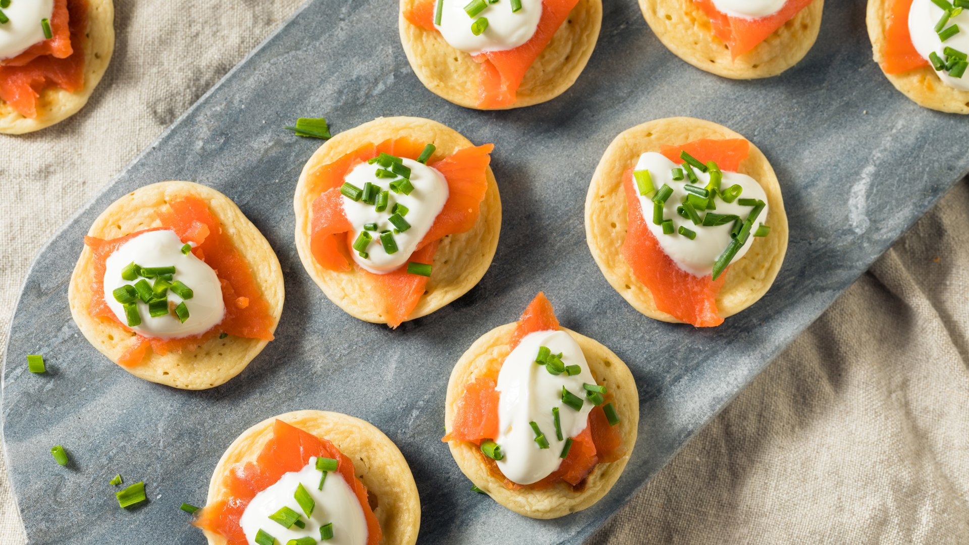 Delicious morsels: these smoked salmon gluten-free blinis are sure to impress. Add salmon roe if you’re feeling indulgent.